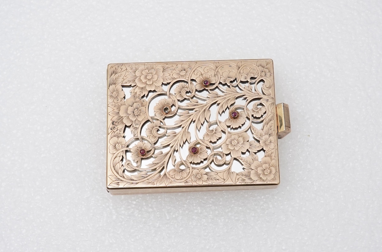 Boucheron, a silver gilt and ruby vanity case, France, 1940s